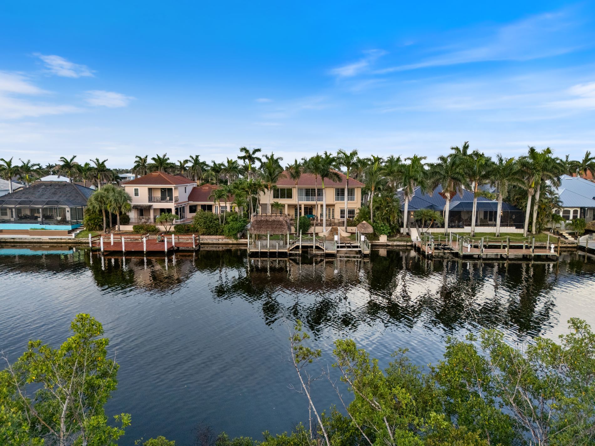 Gulf-access canal homes in Cape Coral with the river and mangroves beyond